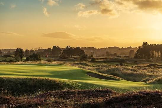 Scottish links golf green at sunrise