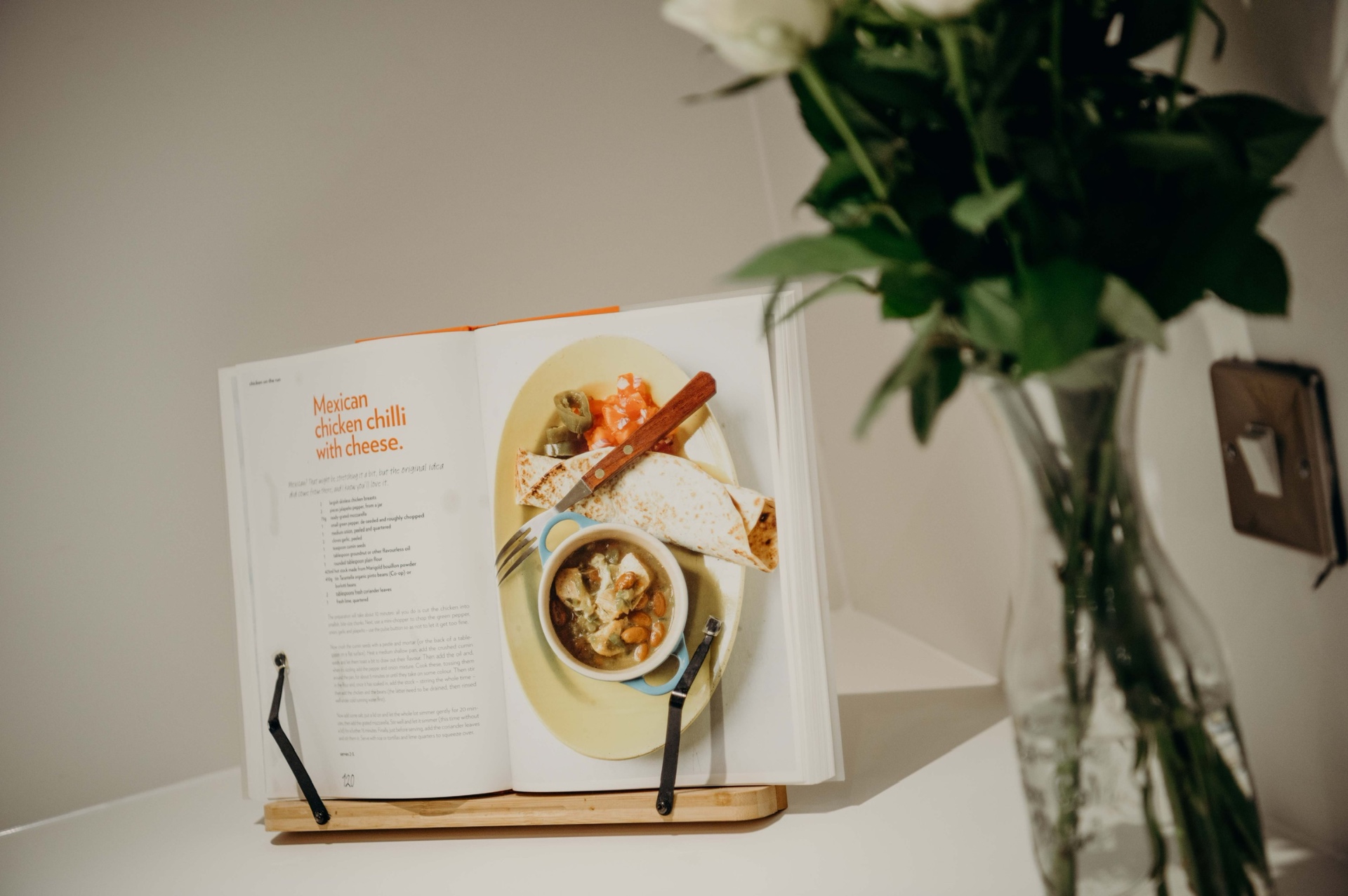 Cookbook and roses